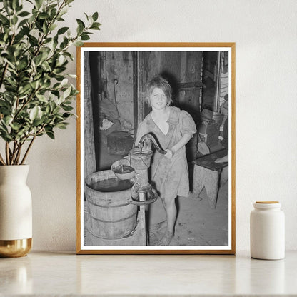 Child Drawing Water in Camp Scene Oklahoma City 1939