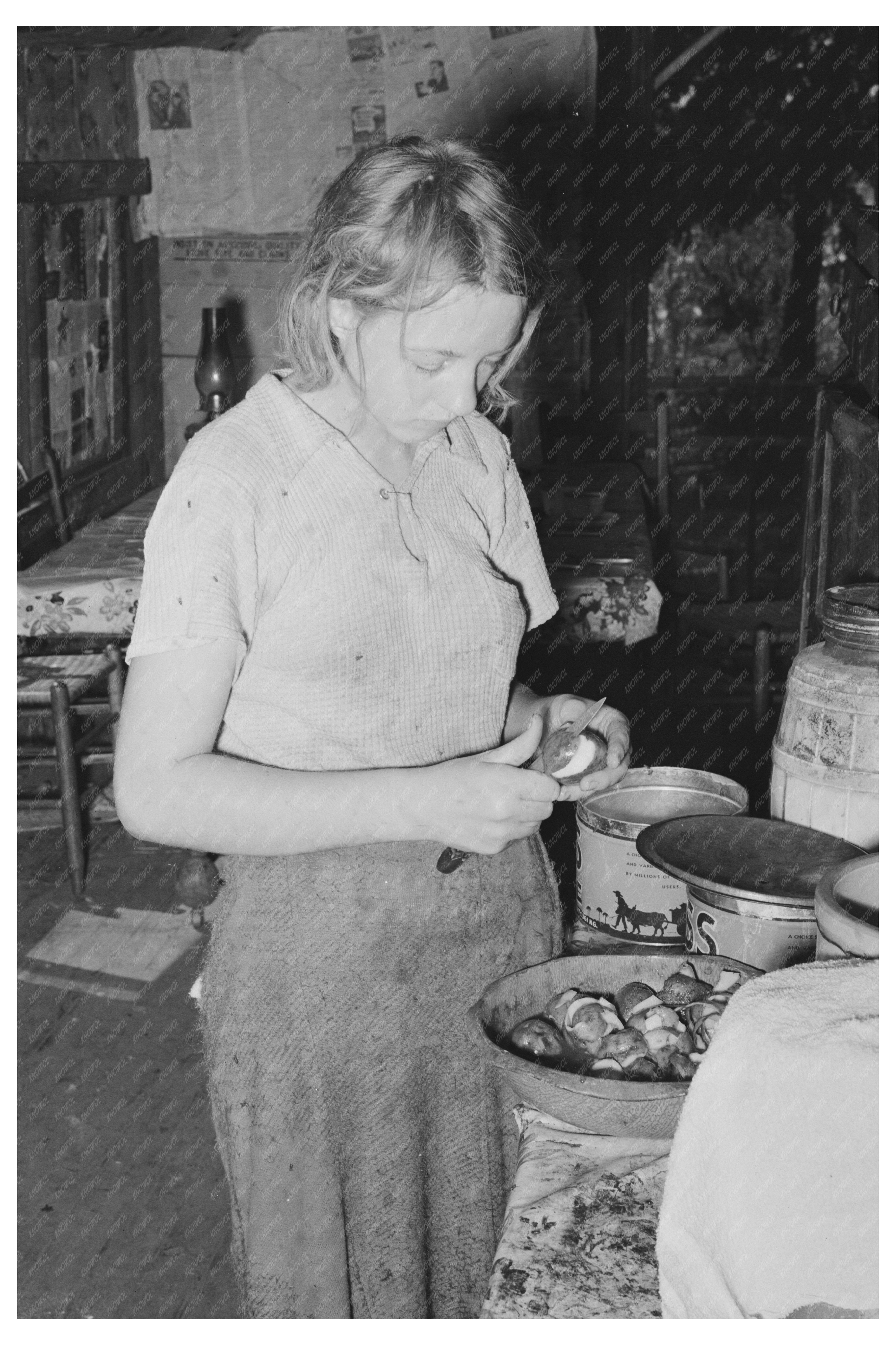 Daughter of Tenant Farmer Peeling Potatoes Muskogee 1939