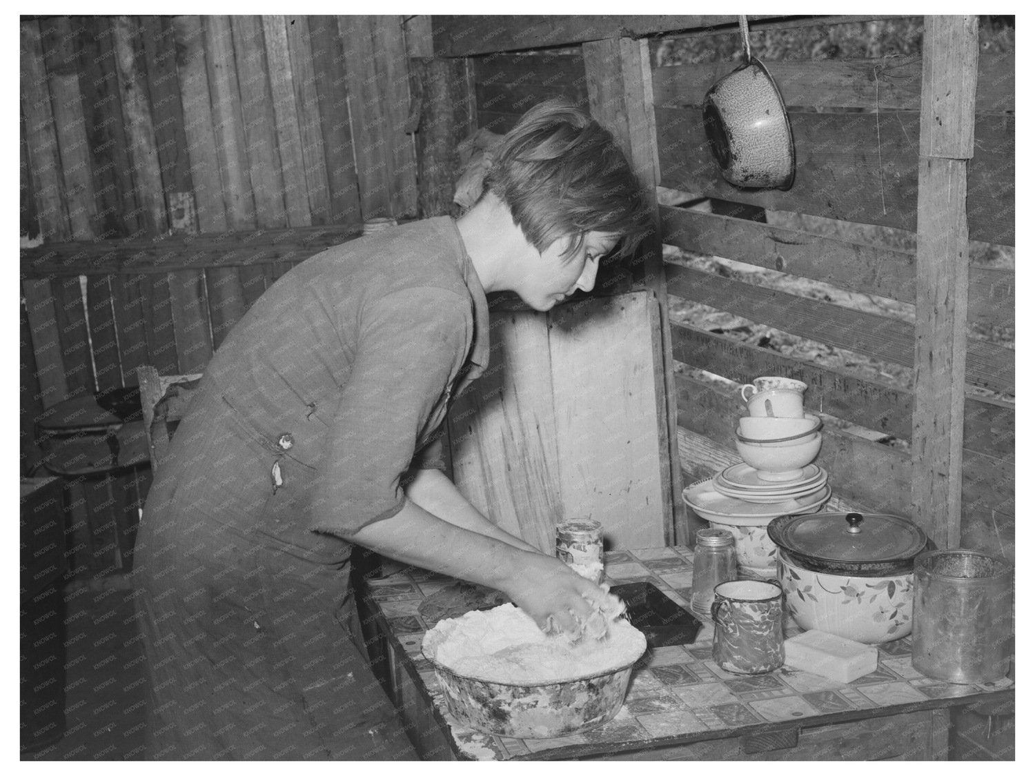Mays Avenue Camp Resident Prepares Biscuits July 1939
