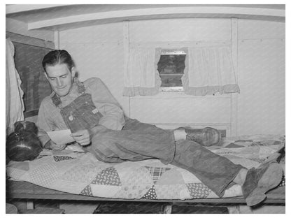 Oil Field Worker Reading Letter in Trailer Home 1939