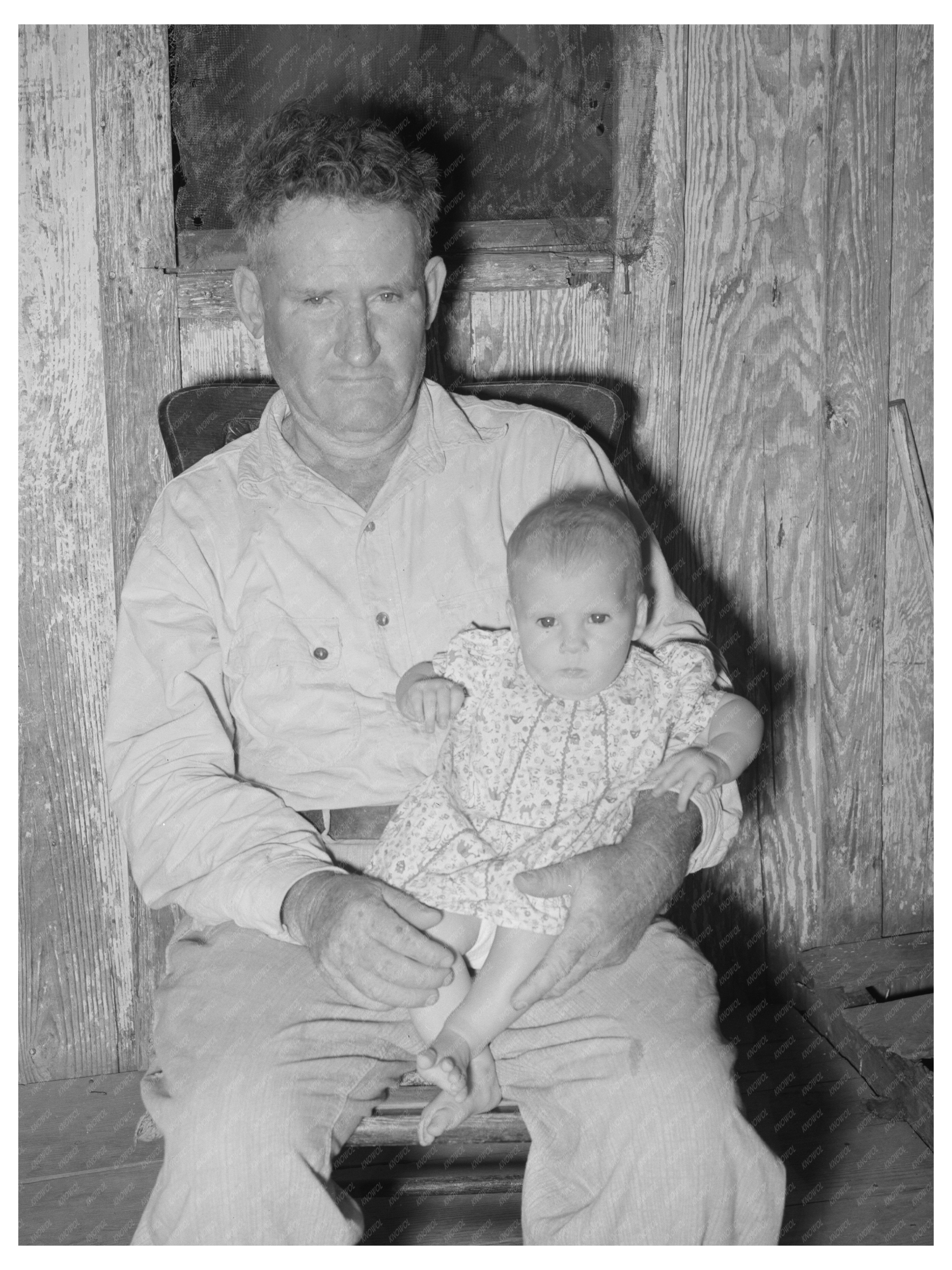 Unemployed Oil Worker with Baby in Seminole Oklahoma 1939