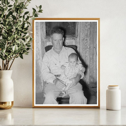 Unemployed Oil Worker with Baby in Seminole Oklahoma 1939