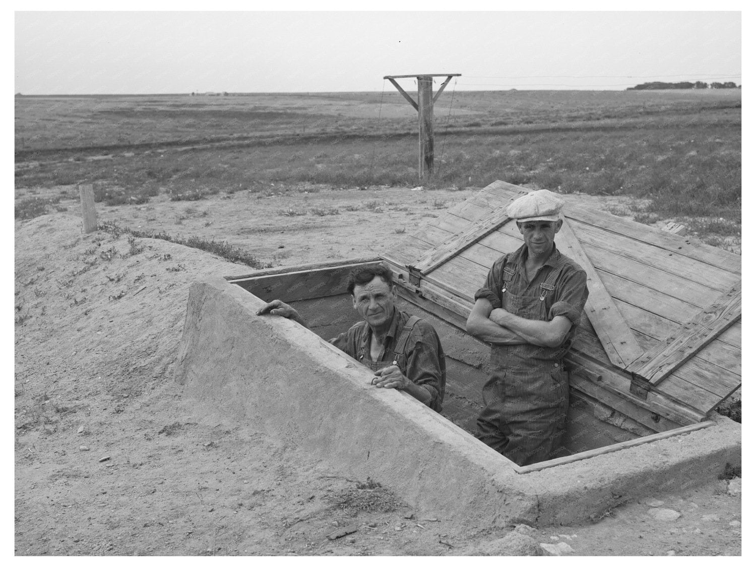 Mr. Shoenfeldt and Son at Fruit Cellar Kansas 1939