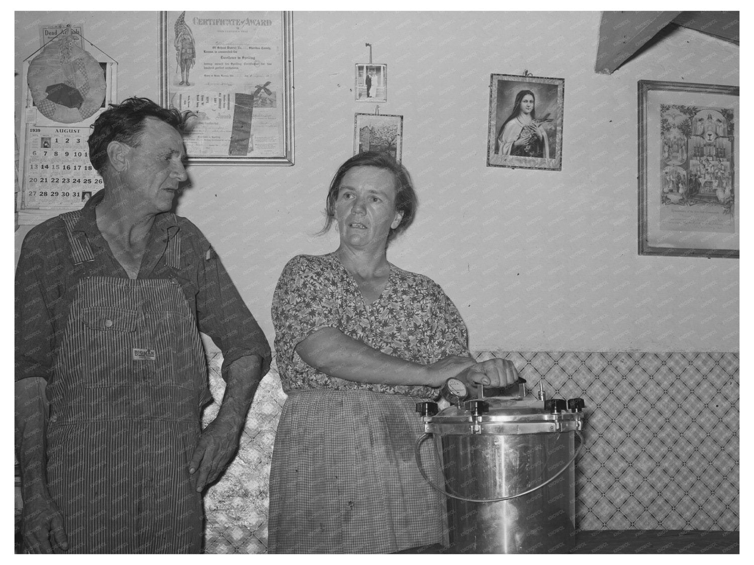 Mr and Mrs Schoenfeldt with Pressure Cooker Kansas 1944