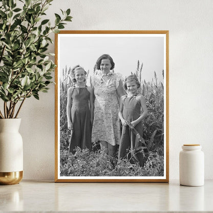 Woman and Daughters in Kansas Garden August 1939