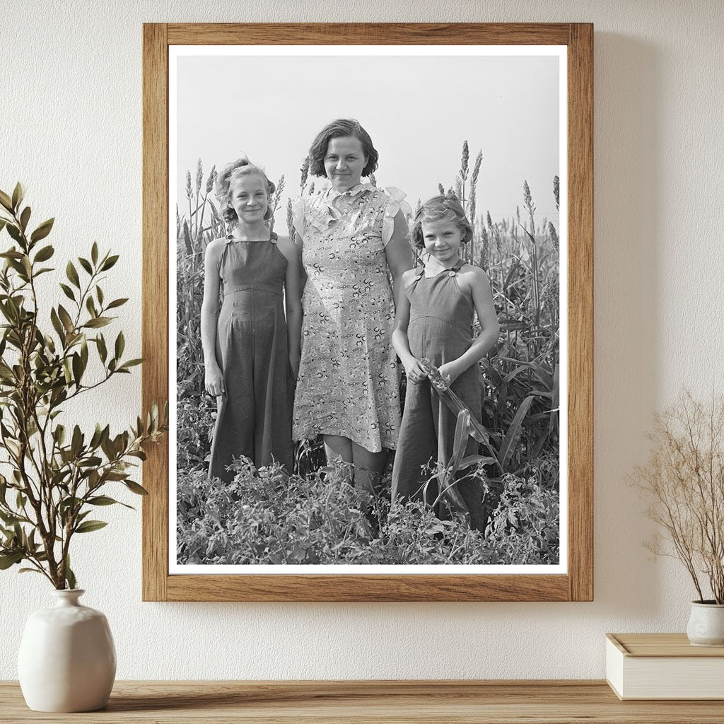 Woman and Daughters in Kansas Garden August 1939