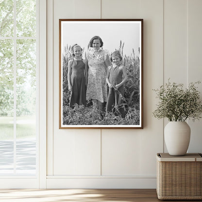 Woman and Daughters in Kansas Garden August 1939