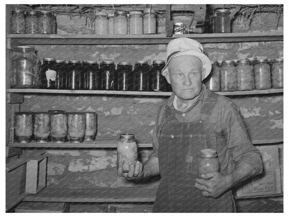 Mr. Bosley in Baca County Cellar with Canned Fruits 1939