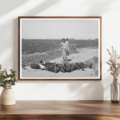 Mrs. Ernest W. Kirk Jr. Feeding Chickens Colorado 1939