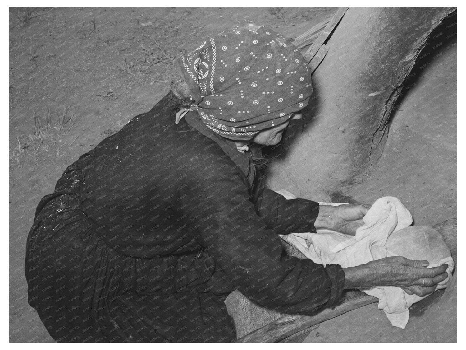 Spanish-American Woman Baking Bread in Taos 1939