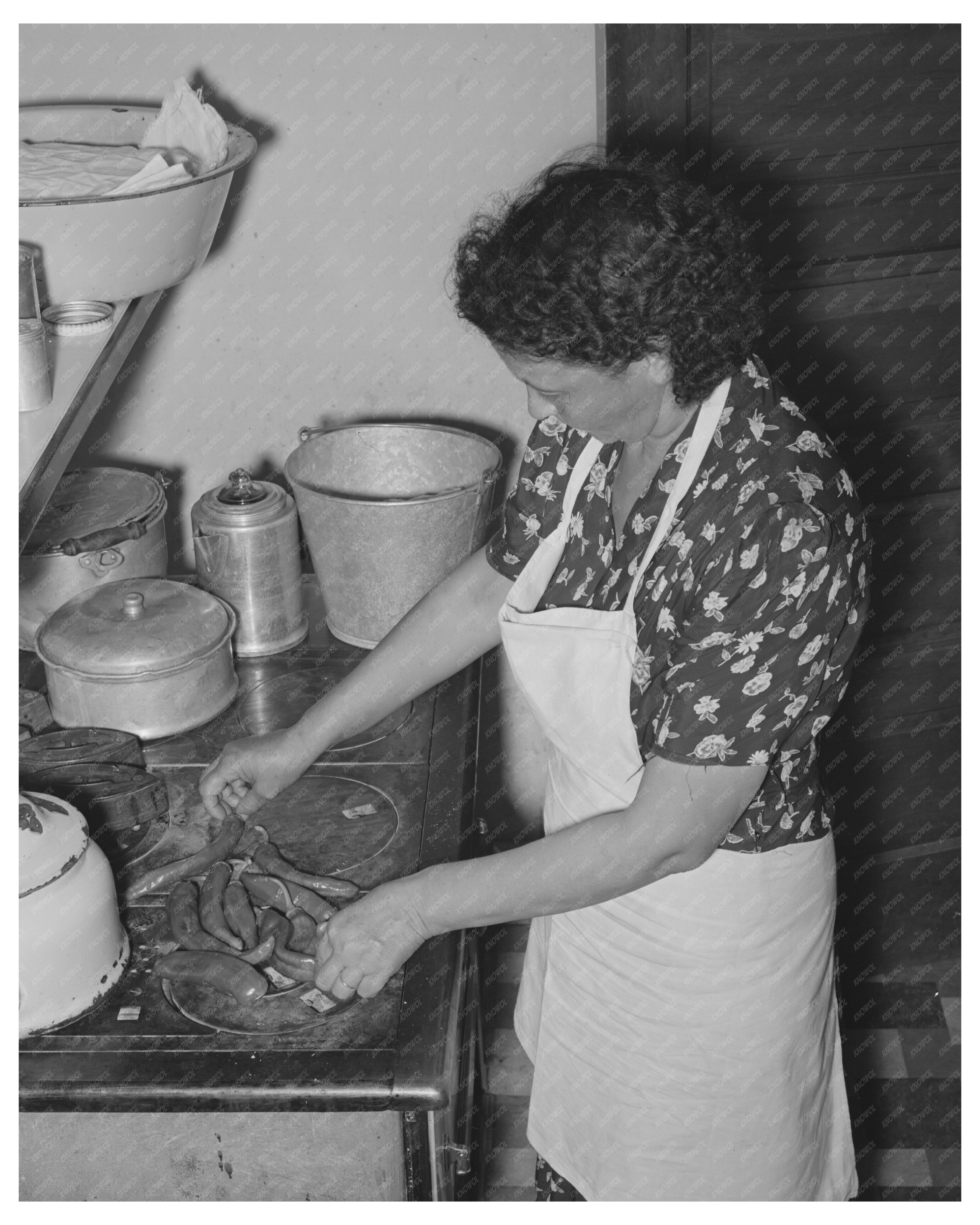 Ofelia Sandoval Cooking Peppers in Taos New Mexico 1939