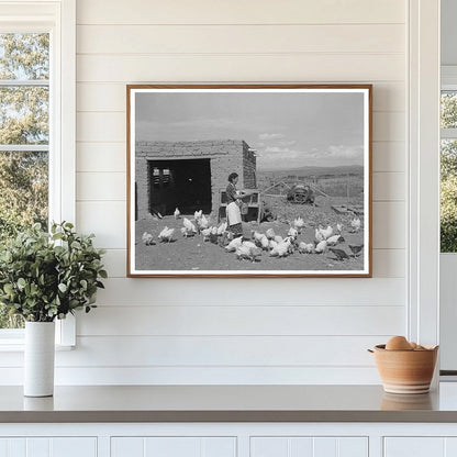 Ofelia Trujillo Feeding Chickens in Taos New Mexico 1939