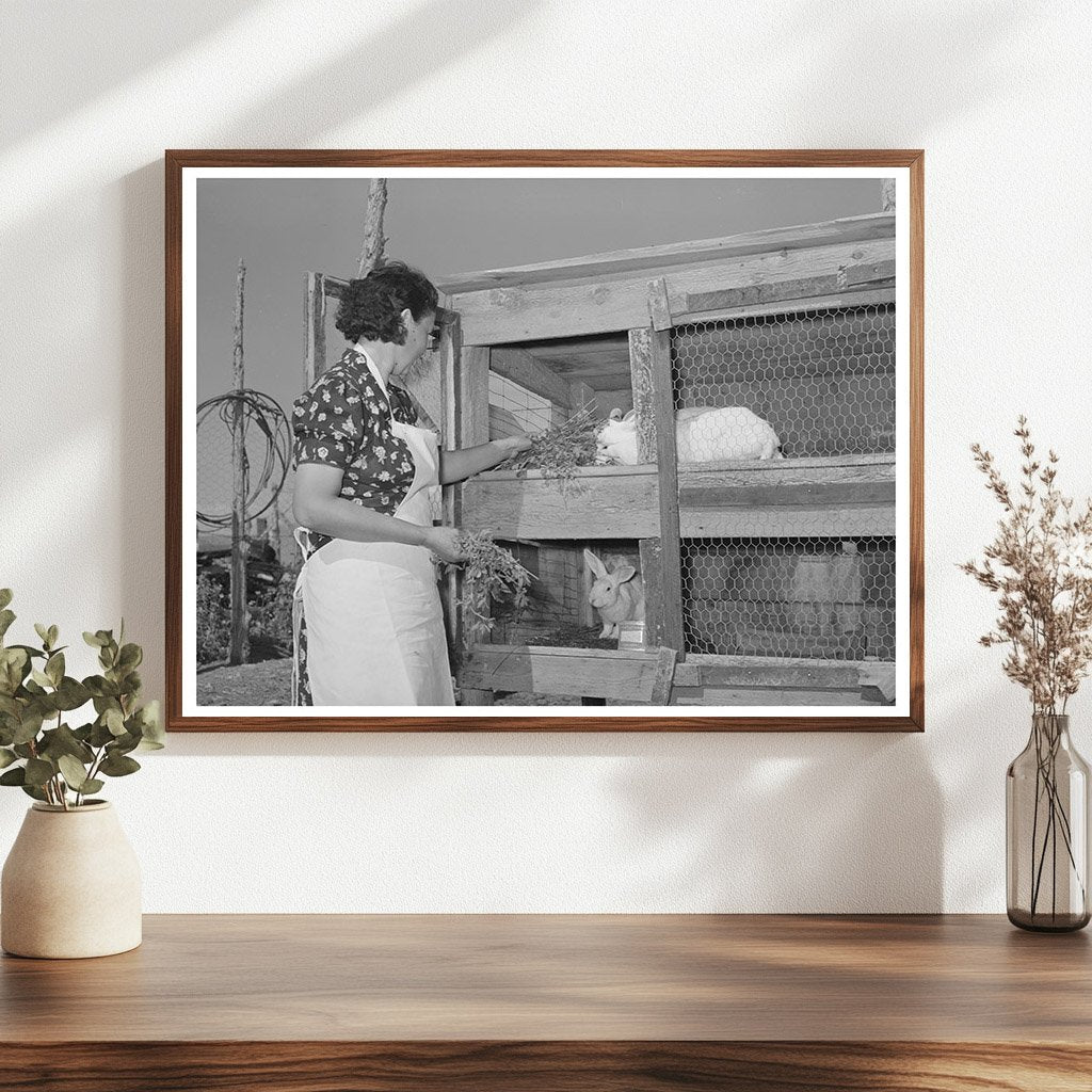 Ofelia Trujillo Feeding Rabbits in Taos New Mexico 1939