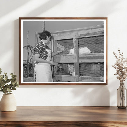 Ofelia Trujillo Feeding Rabbits in Taos New Mexico 1939