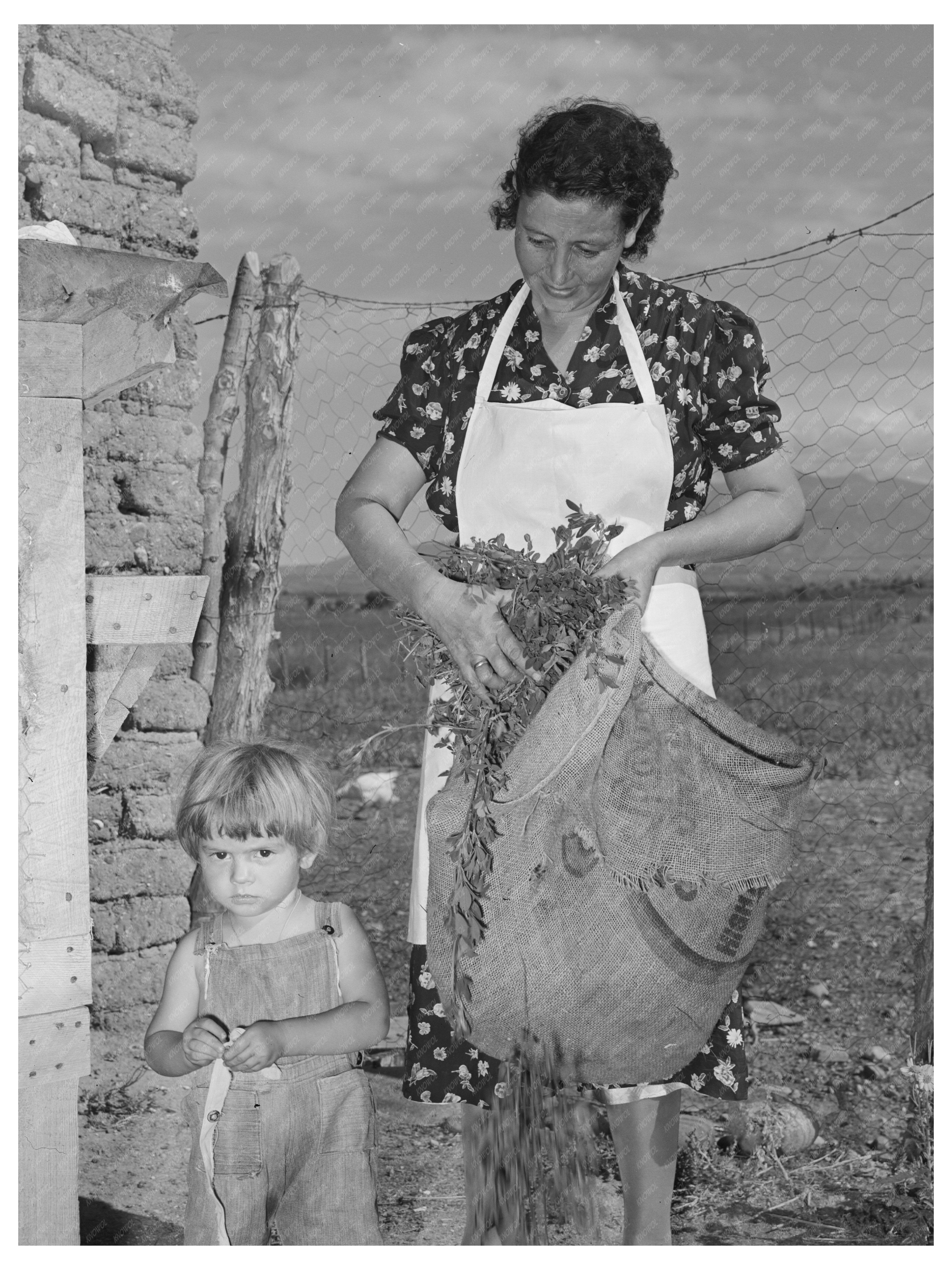 Ofelia Trujillo Sandoval and Son in Taos 1939