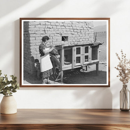 Ofelia Trujillo Sandoval Feeding Rabbits Taos 1939