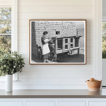 Ofelia Trujillo Sandoval Feeding Rabbits Taos 1939