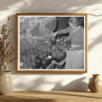 Woman Inspecting Canned Goods in Vermont Cellar 1939