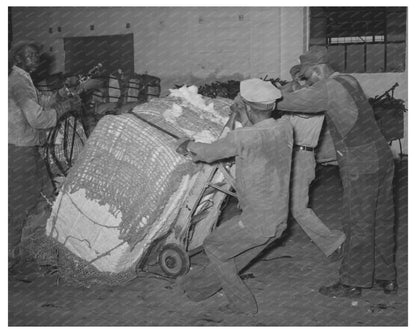 Loading Cotton Bale onto Truck in Houston 1939