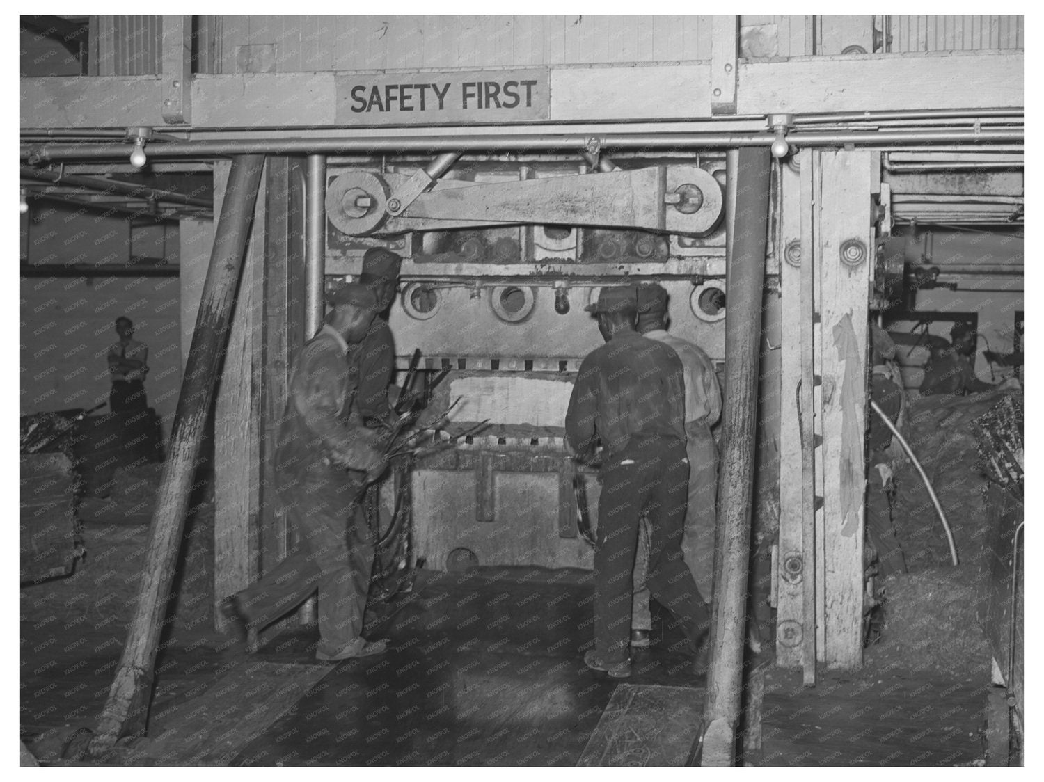Laborers in Houston Texas Compressing Cotton Bales 1939