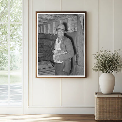 Man Holding Chicken at Brownwood Poultry House 1939