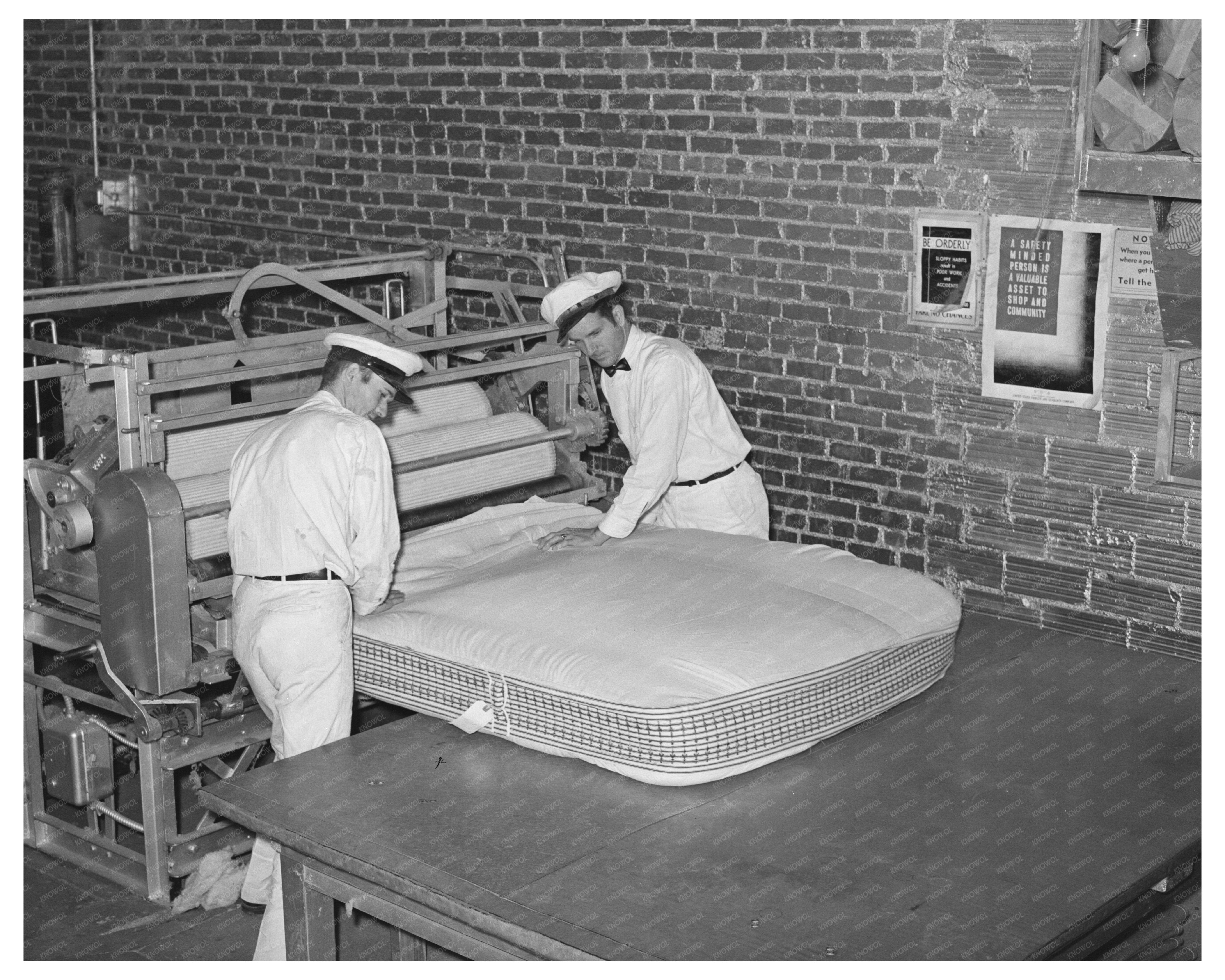 1939 Workers Filling Mattress Case with Cotton Linters