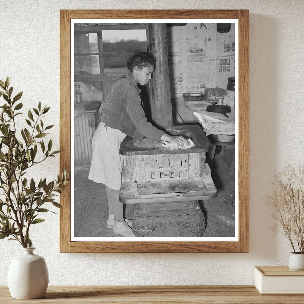 Daughter of Tenant Farmer Cleaning Stove Oklahoma 1940