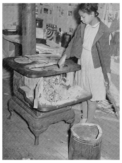 Daughter of Tenant Farmer Prepares Morning Fire 1944