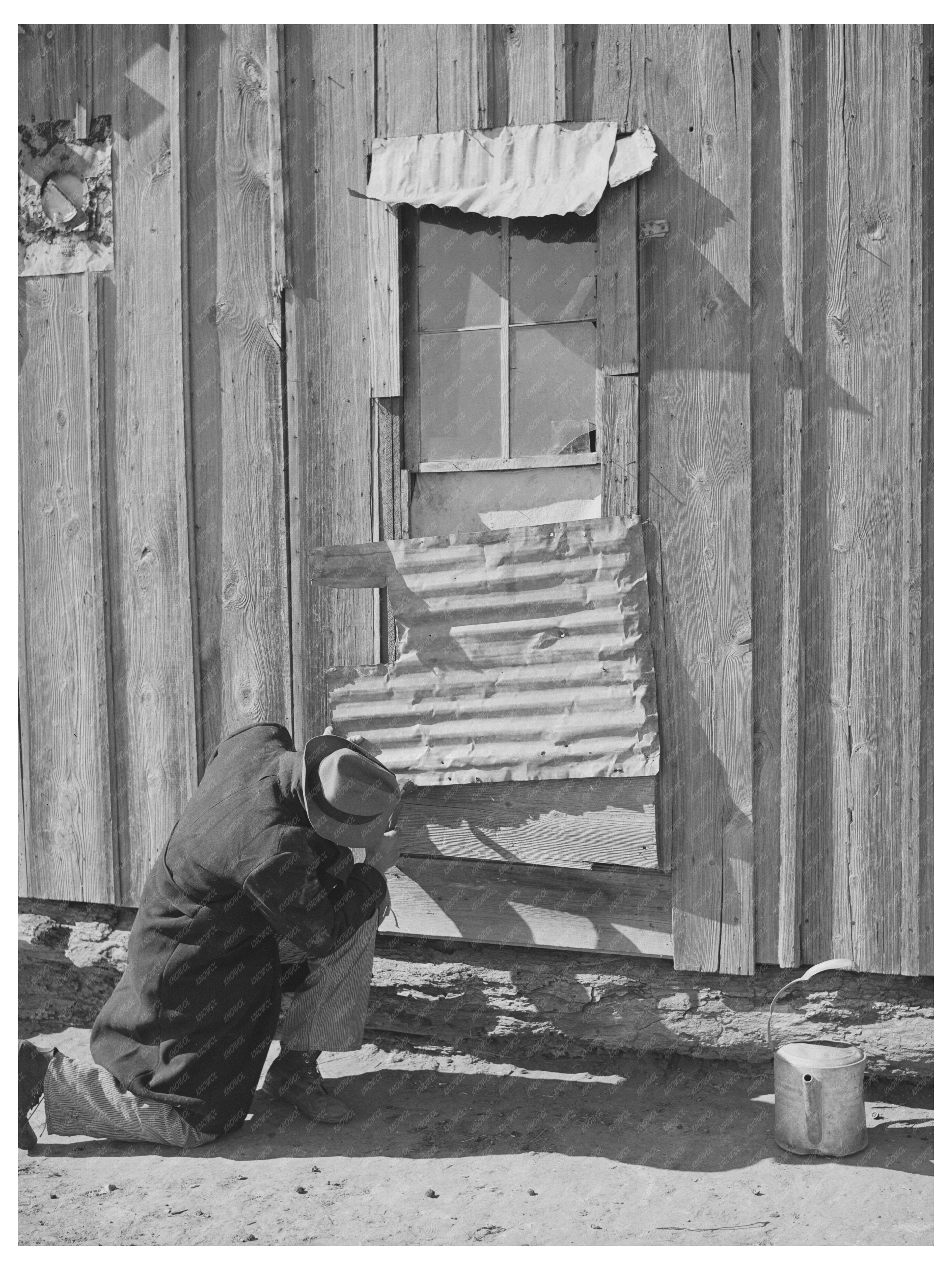 Pomp Hall Repairing Window in Creek County Oklahoma 1944