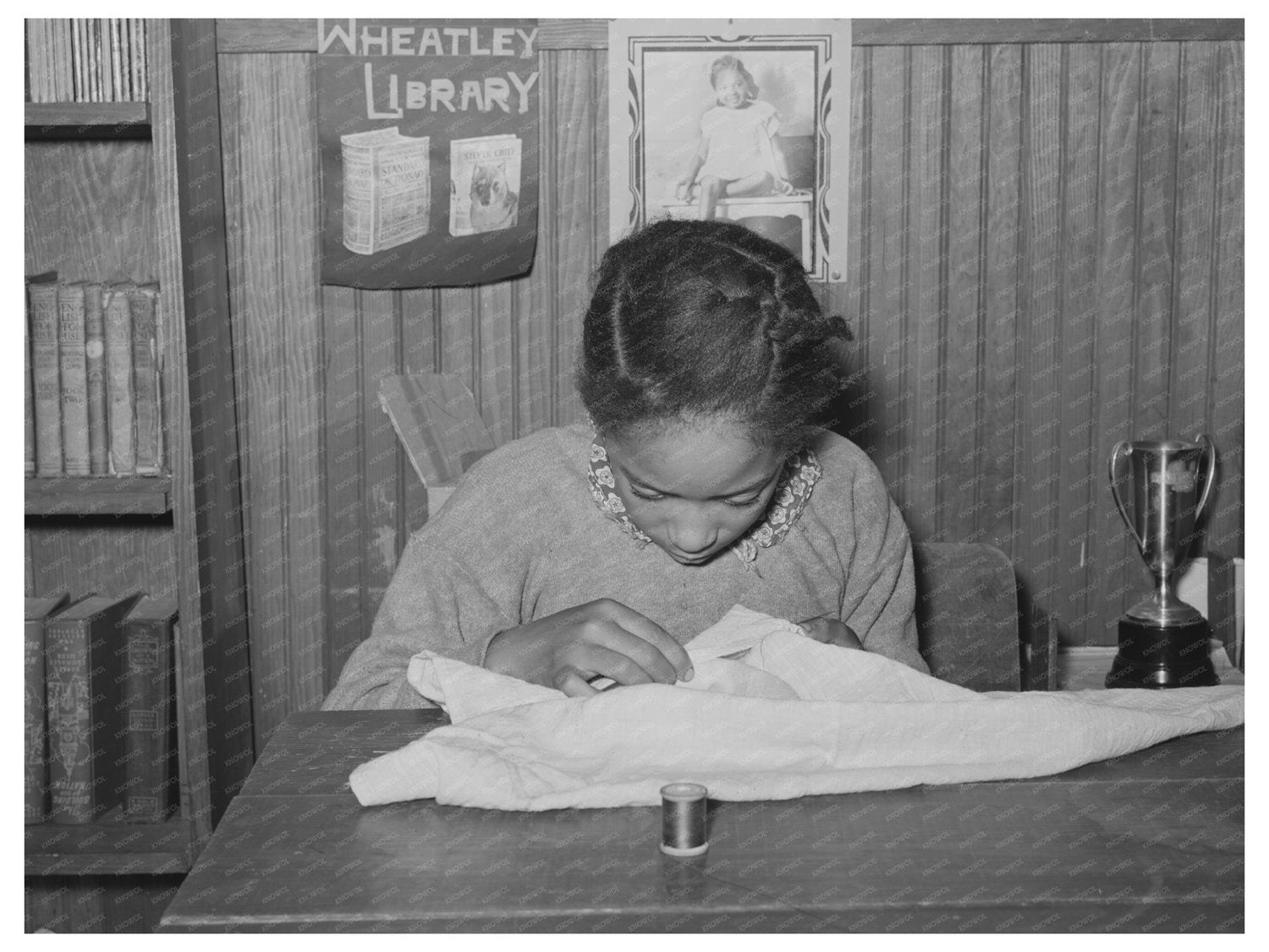 Daughter of Tenant Farmer Sewing Oklahoma February 1944