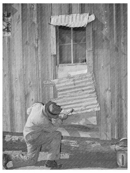 Pomp Hall repairing window tin in Creek County Oklahoma 1944