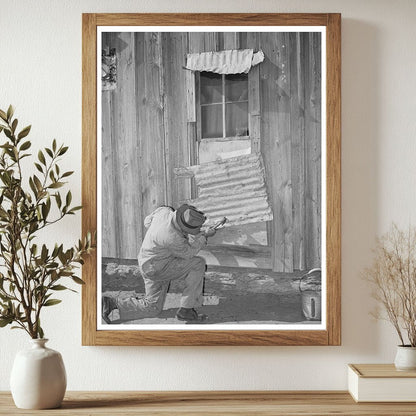 Pomp Hall repairing window tin in Creek County Oklahoma 1944