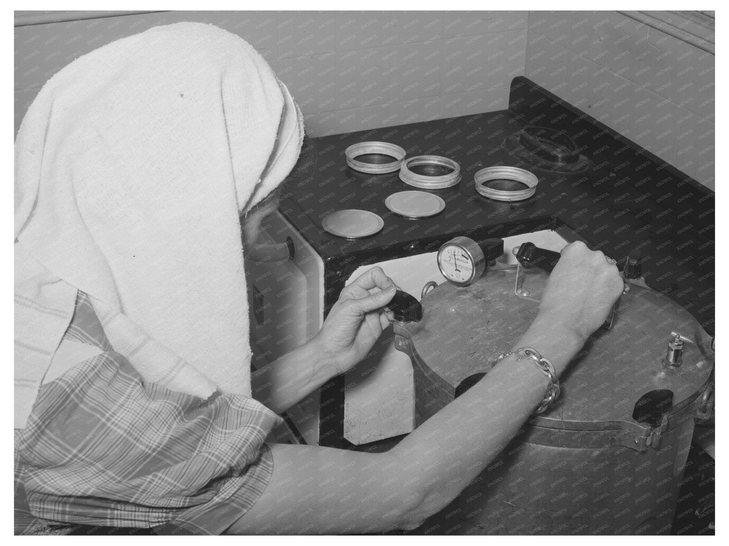 FSA Supervisor Demonstrates Pressure Canning 1944