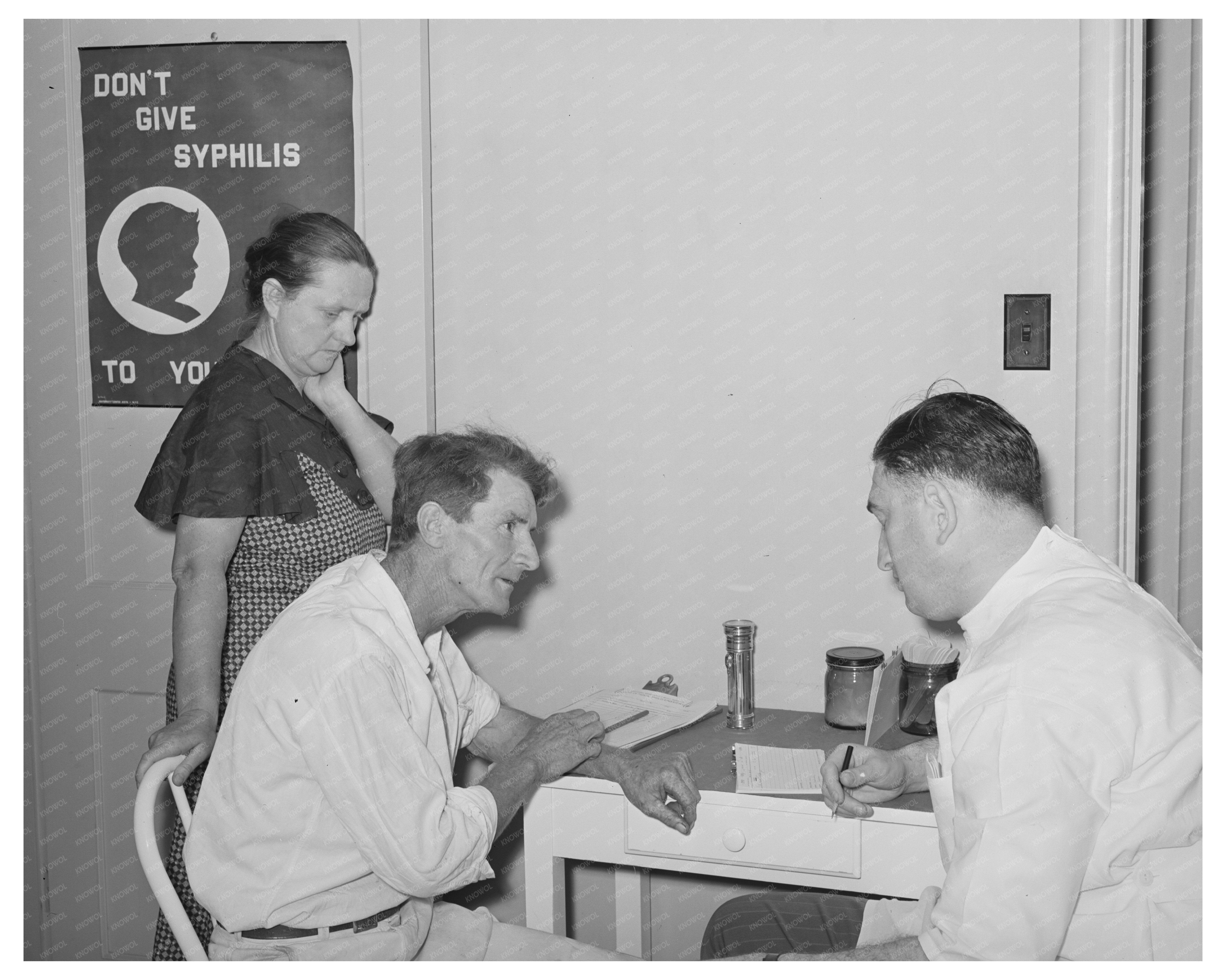 Doctor Examines Agricultural Worker in Arizona 1940