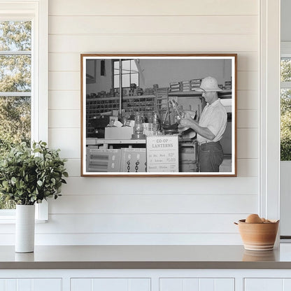 Cooperative Member Examines Lantern in Phoenix 1940