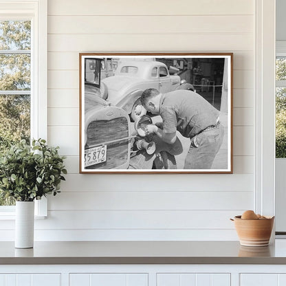 Repairman Replaces Light Bulb in Phoenix 1940