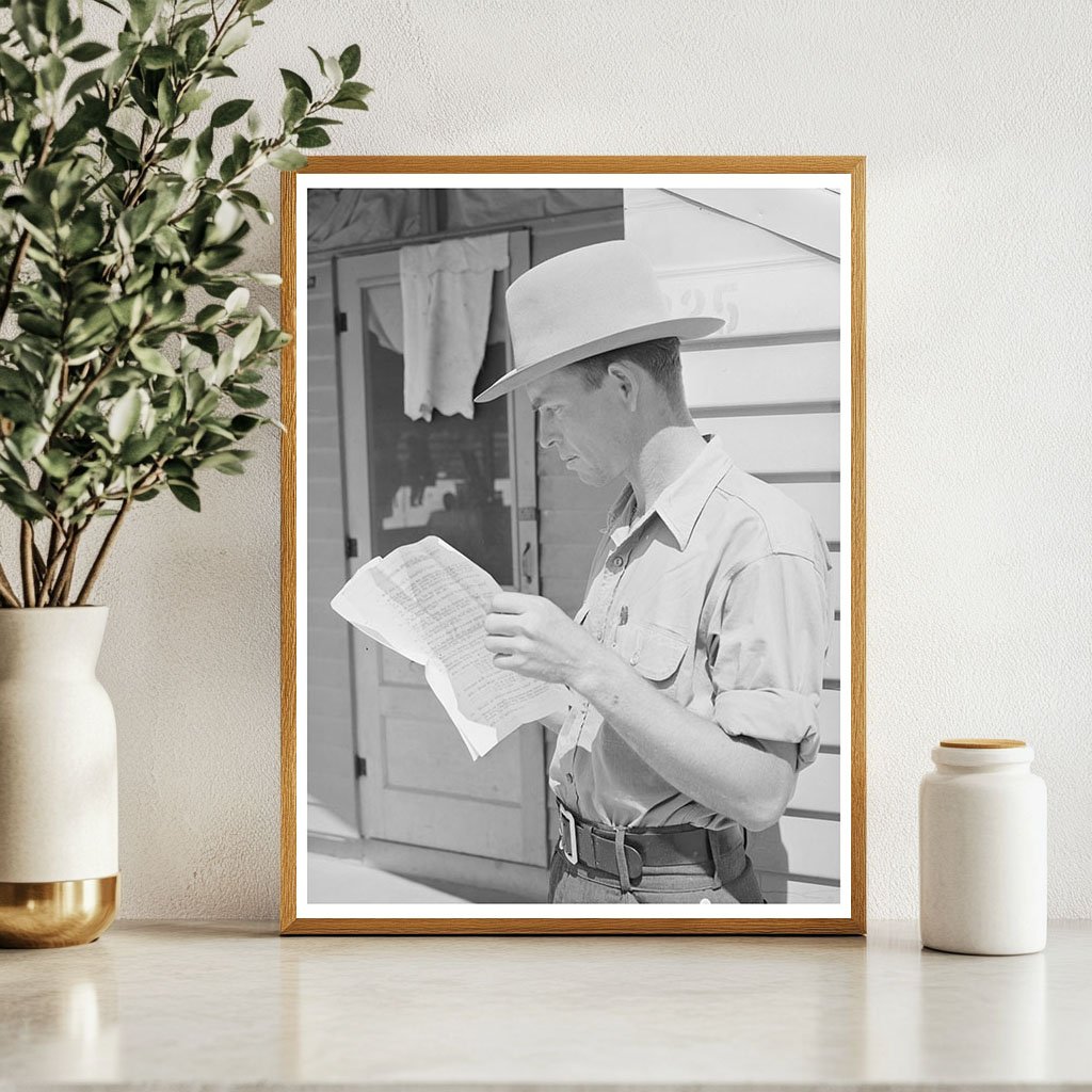 Migratory Worker Reads Truck License Instructions 1940