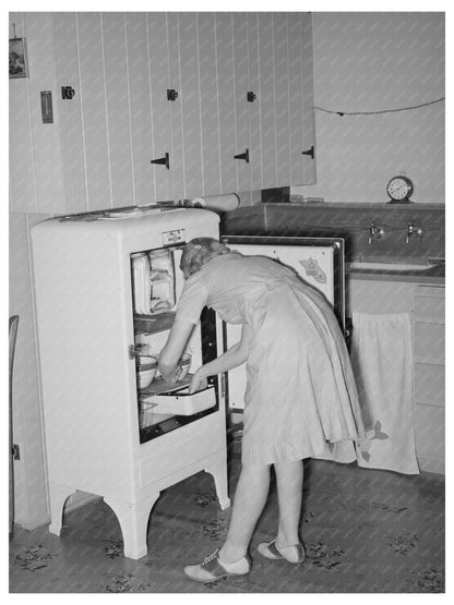 Wife of Chandler Unit Farmer in Kitchen May 1940