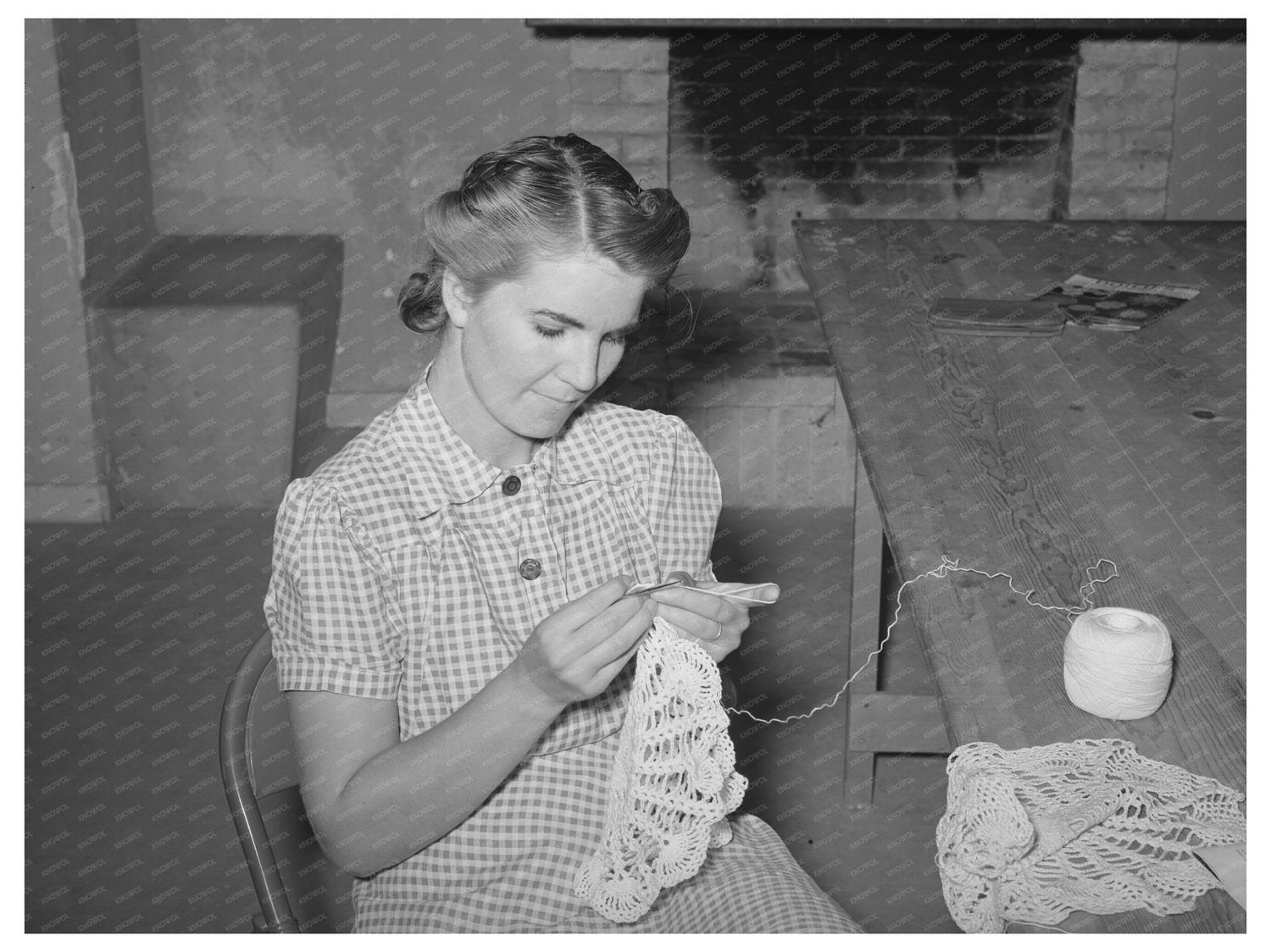 Arizona Farm Worker Crocheting in Community Building 1940