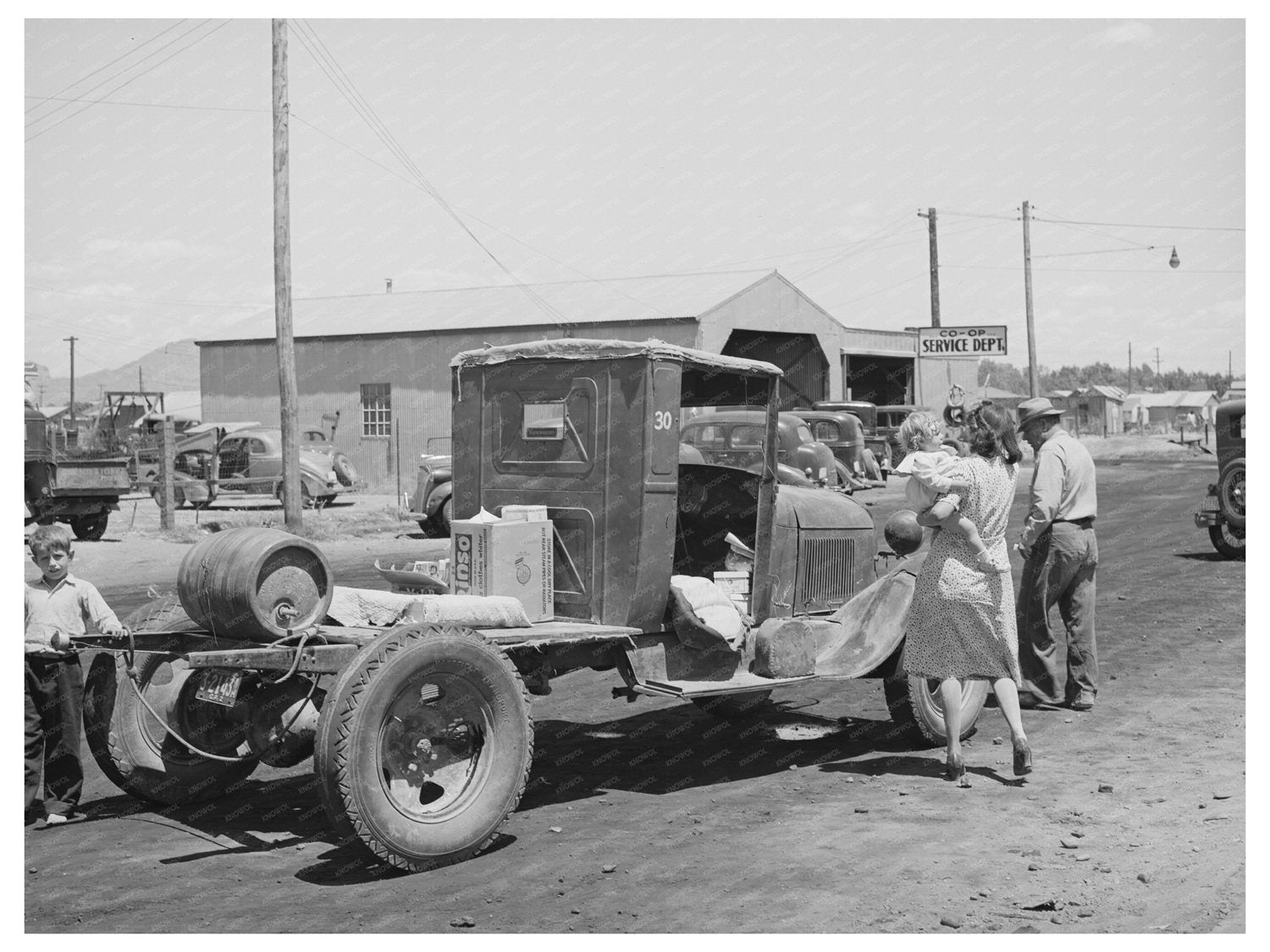 1940 Farmer in Phoenix AZ by Truck with Goods