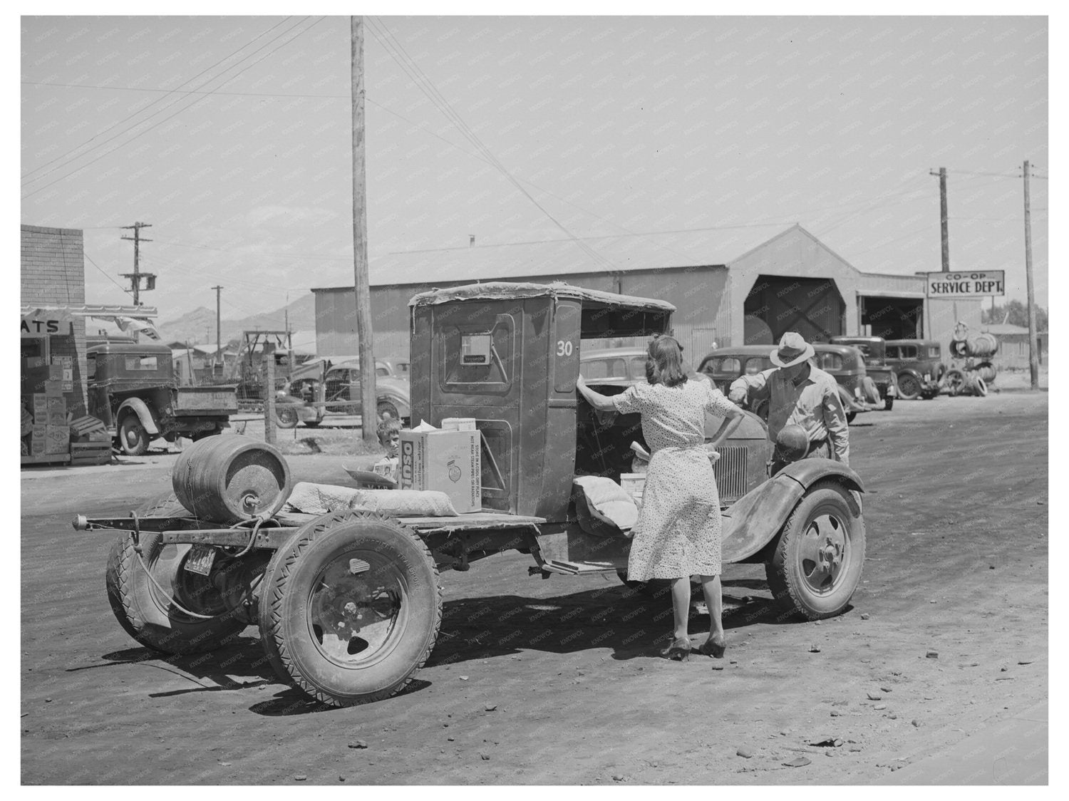 1940 Farmer in Phoenix Arizona with Truck of Goods