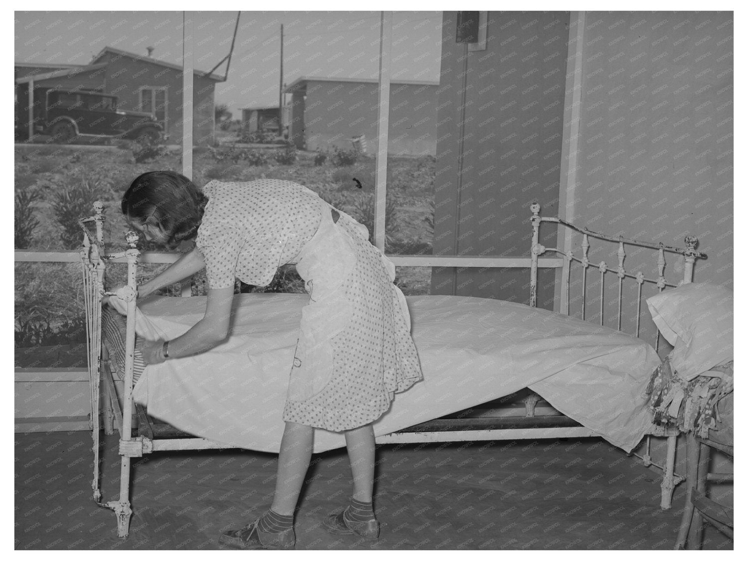 1940 Vintage Image of Arizona Woman Making Bed on Porch