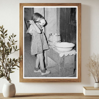 Josie Drinking Water in Pie Town New Mexico May 1940