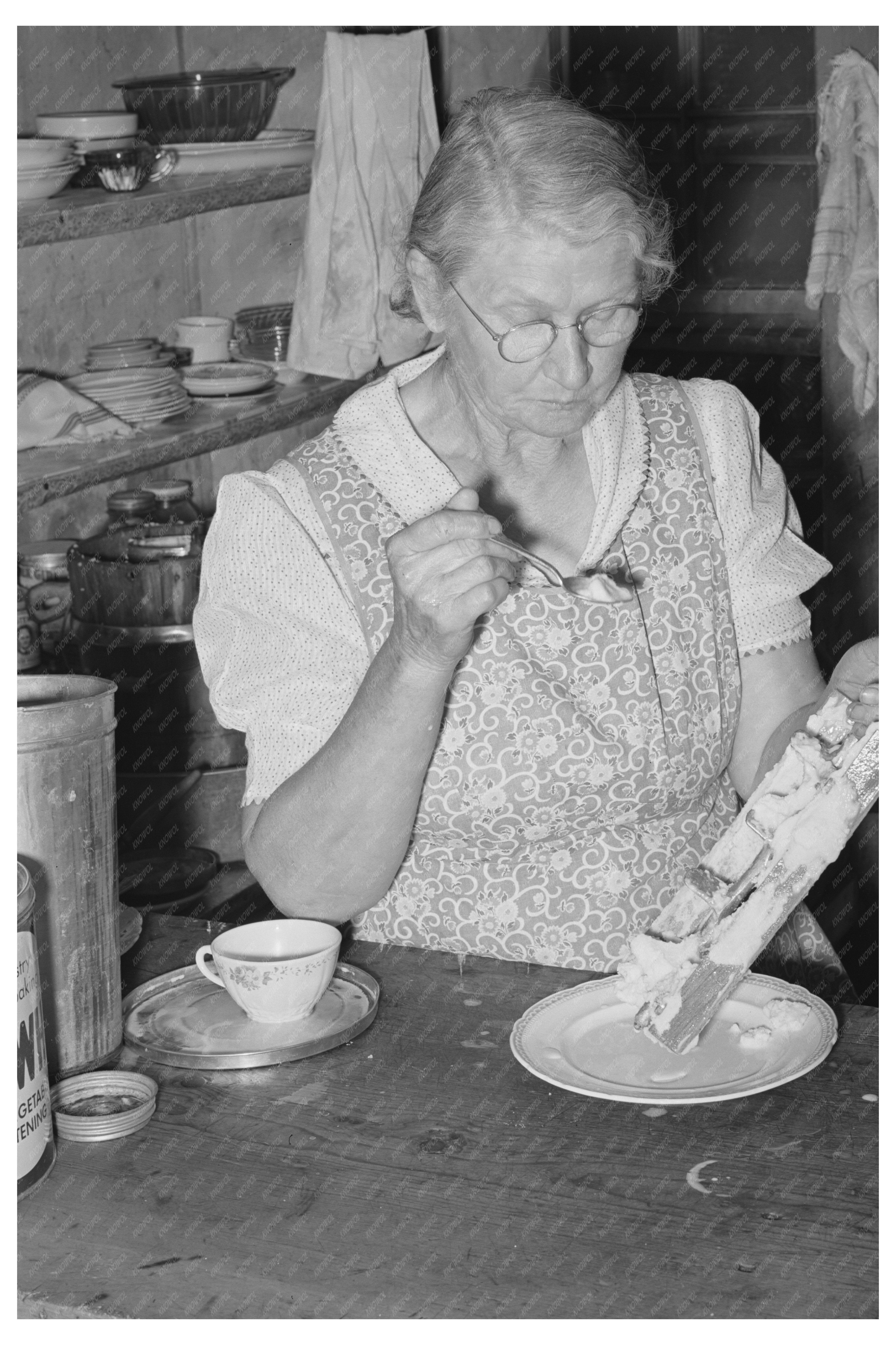 Mrs. Holley Sr. Eating Ice Cream in Pie Town New Mexico 1940