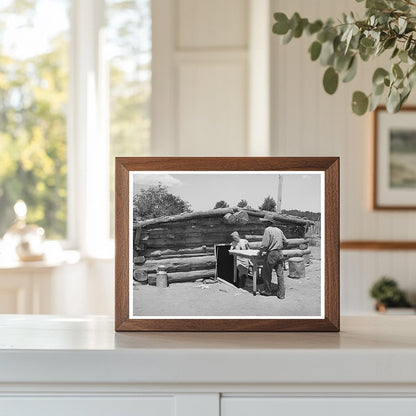 Mr. and Mrs. Faro Caudill Moving Table in Pie Town 1940