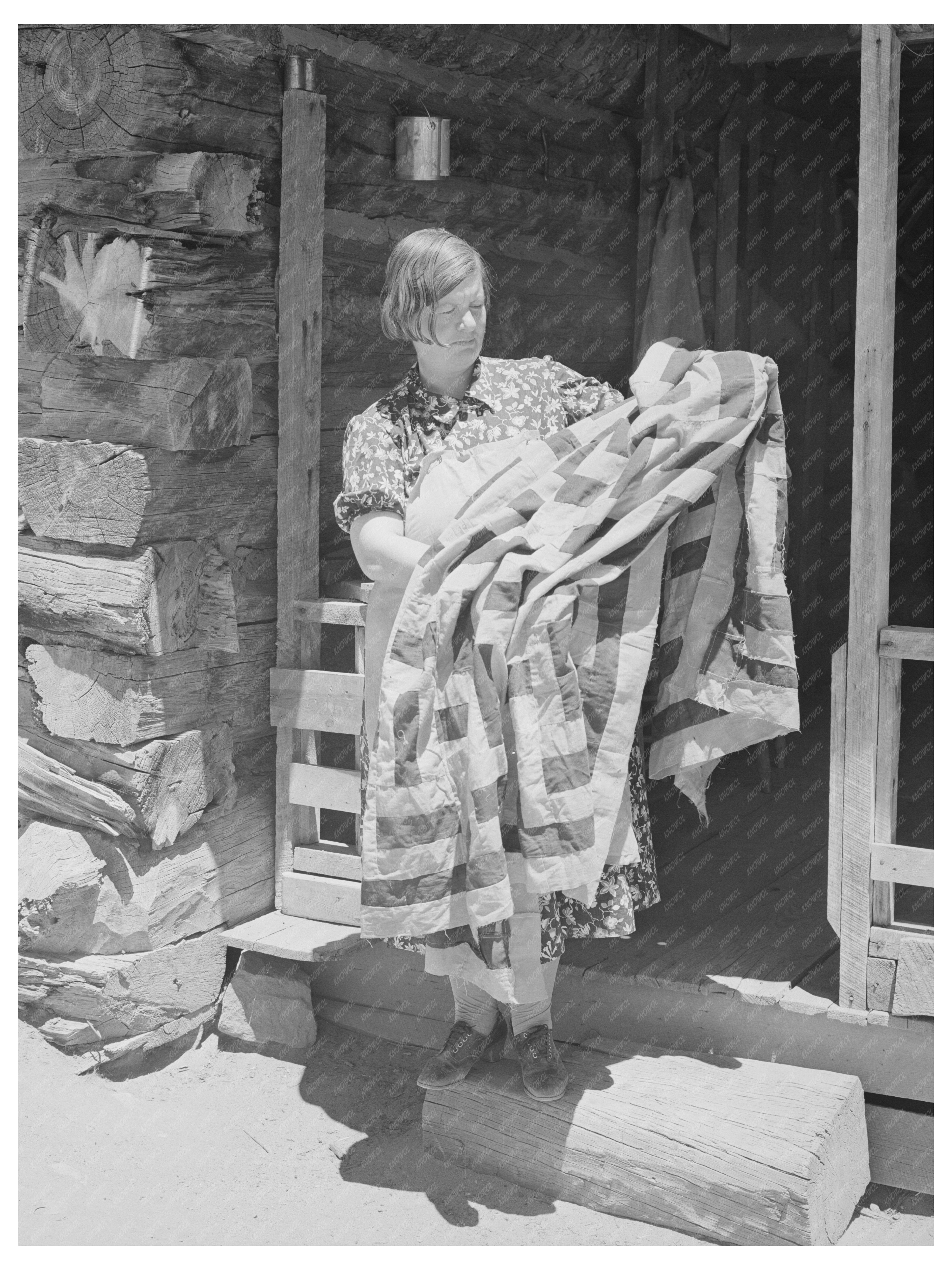 Mrs. Bill Stagg with Tobacco Sack Quilt June 1940