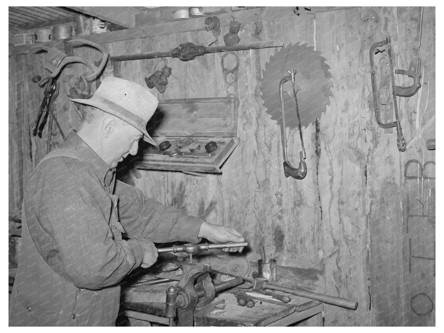 George Hutton Sr. in Machine Shop Pie Town New Mexico 1940