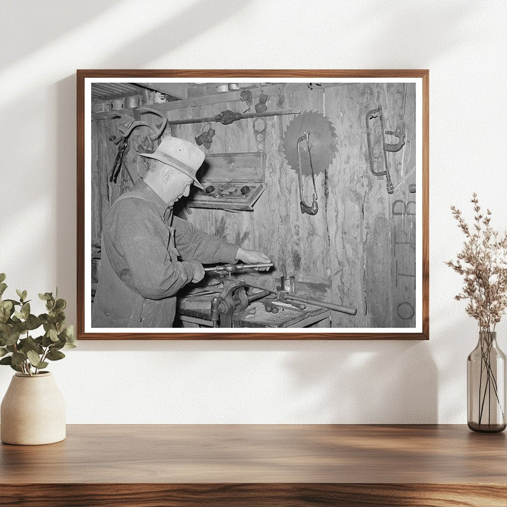 George Hutton Sr. in Machine Shop Pie Town New Mexico 1940