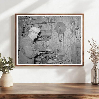 George Hutton Sr. in Machine Shop Pie Town New Mexico 1940