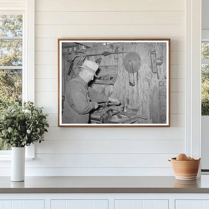 George Hutton Sr. in Machine Shop Pie Town New Mexico 1940